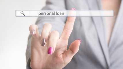 Wall Mural - female hand touching a web search bar with the word personal loan on a virtual screen