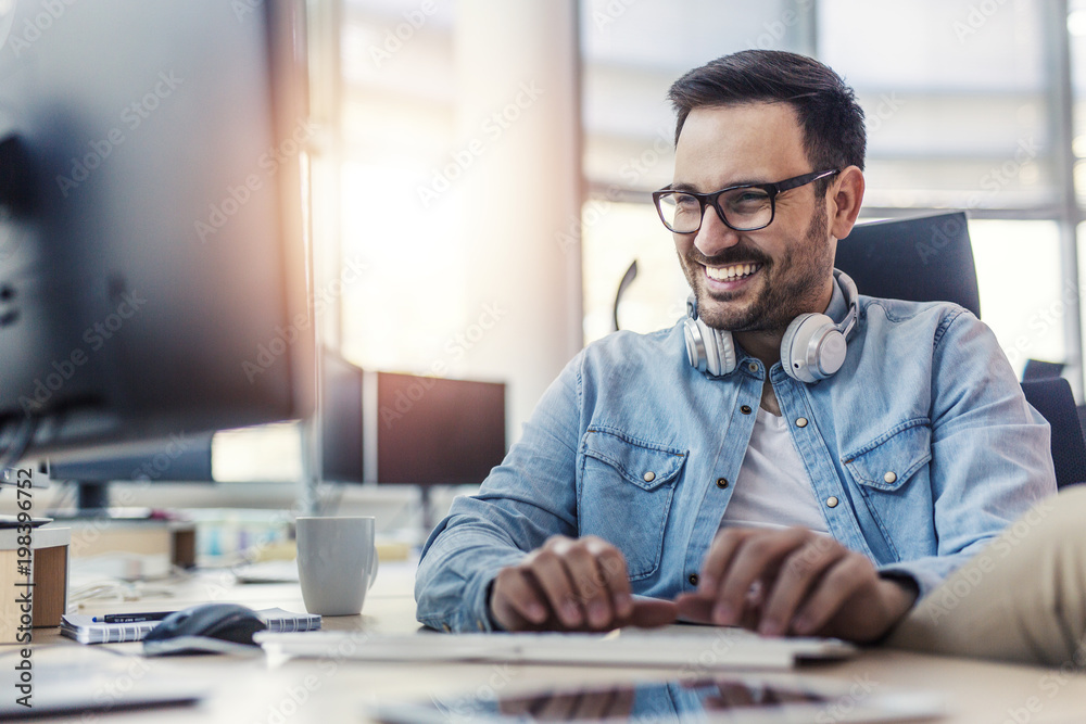 Happy programmer Stock Photo | Adobe Stock