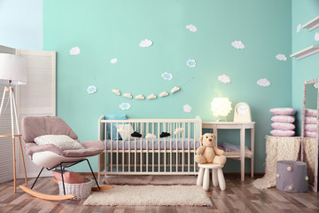 Poster - Modern baby room interior with crib and rocking chair
