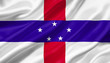 © adaptice - Netherlands Antilles flag waving with the wind, 3D illustration.