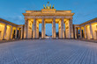 The illuminated Brandenburg Gate in Berlin, Germany, before sunrise