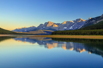 Wall Mural - Lower Kananaskis Lake at sunset on a clear summer day, Alberta, Canada