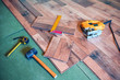 © Volodymyr Shevchuk - carpenter tools on the laminated floor