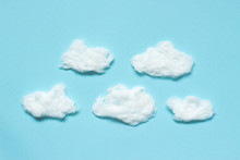 White Clouds From Cotton Wool On Blue Background. Soft Texture.