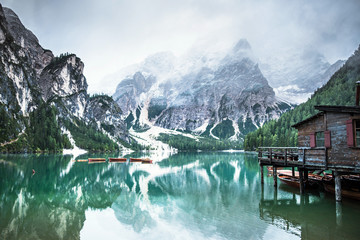 Wall Mural - Braies lake and boats in mountain in Dolomites,Italy, Pragser Wildsee