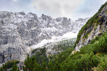 Wall Mural - panoramic view of snowy mountain peak in winter, dolomites, italy