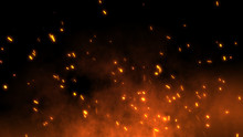 Burning Red Hot Sparks Fly Away From Large Fire In The Night Sky. Beautiful Abstract Background On The Theme Of Fire, Light And Life. Fiery Orange Glowing Flying Particles Over Black Background In 4k