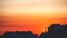 Orange Sunset Over Rooftops, Toned