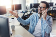 © Jelena - Programmer having phone call