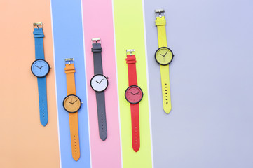 Set of multicolored wristwatches for background