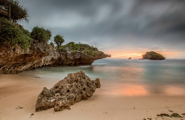 Amazing view of Yogyakarta seascape with natural coastal rock as foreground