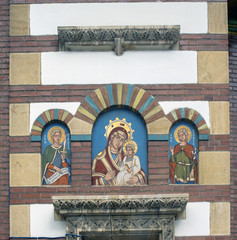 Religious details over the gate of the Orthodox Church in Sinaia, Romania.