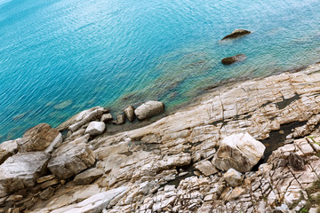 beautiful stones on the sea background beautiful sea view  large stones and blue sea