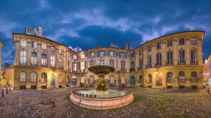 Wall Mural - Panorama of Place Albertas square at dusk in Aix-en-Provence, France (static image with animated sky and water)