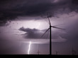 Thunderstorm with lightnings over a wind farm