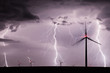 Thunderstorm with lightnings over a wind farm