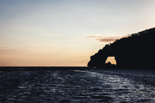 Natural Arch With A Sunrise