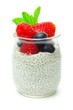 Healthy berry chia pudding in a jar isolated on a white background