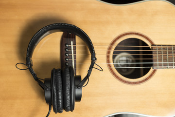 Headphones Over Acoustic Guitar