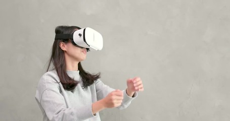 Wall Mural - Woman watching with VR device