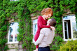 © Kiryl Lis - young handsome man hugging pretty young redhead woman