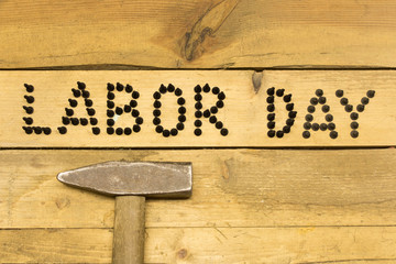 Wall Mural - Labor day.  Different tools on a wooden table