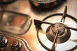 © andrea - close-up of kitchen stove with background
