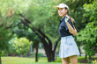 Asian woman play golf