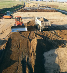 trcuk, bulldozer and compactor