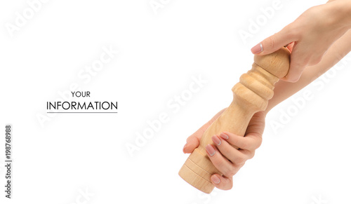 Fotomural Pepper mill wooden in hand pattern