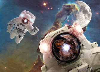 Wall Mural - asrtonauts in the space univese on the pillar of creation background. elements of this image furnish