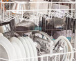 © Jannik - Open dishwasher with clean dishes