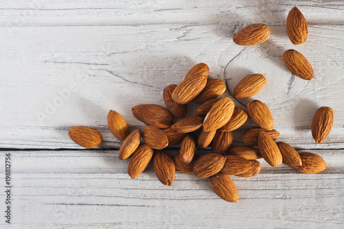 Cuadros en Lienzo Useful nuts almonds on the table