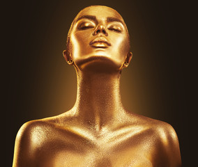 Wall Mural - fashion art golden skin woman portrait closeup. gold, jewelry, accessories. model girl with golden g