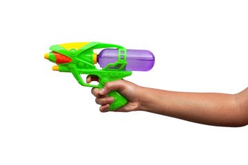 Wall Mural - Hand holding plastic water gun isolated on white background. Objects with clipping path