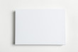© fotofabrika - White business card on wooden table. Blank portrait A4.