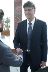 Poster - Handshake of a businessman and a lawyer in the office