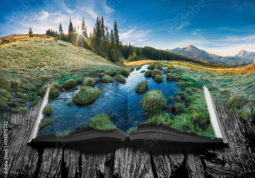 Plakat Alpejska górska dolina na kartach otwartej książki