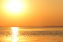 Orange Sun Over The Sea Horizon, Beautiful Sunset, Copy Space, Landscape With A Big Sun, Bloody Horizon Above The Water Surface, Blank For The Designer, Orange Pattern