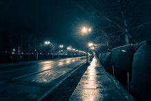 Empty Dark And Wet Urban City Street Road After Rain At Night