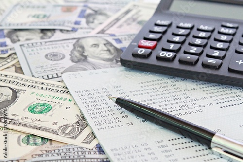 Business Finance Investment Accounting Or Money Exchange Concept Business Finance Investment Accounting Or Money Exchange Concept American Dollars Cash Calculator And Savings Account Pbook Financial