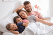 © Africa Studio - Beautiful morning of happy family in bedroom
