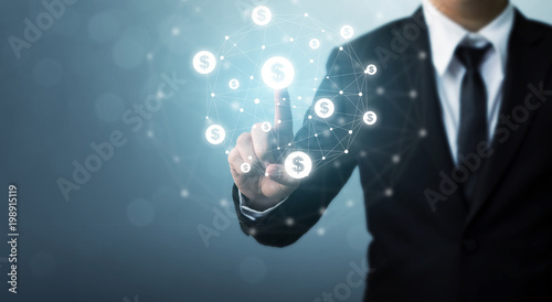 Fotografía Businessman pointion dollar currency icon, Concept online transaction applicatio