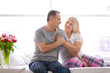 © Africa Studio - Senior couple on bed together at home