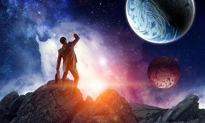 Wall Mural - businessman and cosmos concept