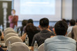 © THANANIT - Rear view of audience listening the specker in front of the meeting room or seminar room, business seminar and education concept