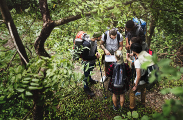 trekking together in a forest