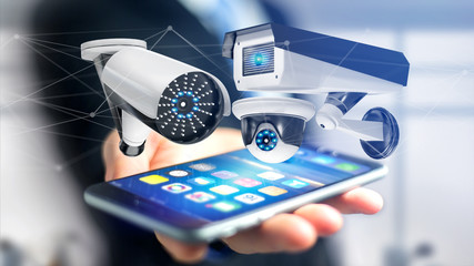 Poster - Businessman using a smartphone with a Security camera system and network connection - 3d rendering