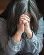 Asian woman prayer praying for christianity holy spirit belief, forgiveness on religion concept, or depressed person with anxiety emotional with panic disorder for mental health illness concept