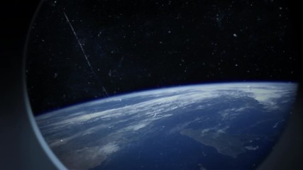 earth is seen through scratched window of a spaceship. vintage 8mm grain added to footage